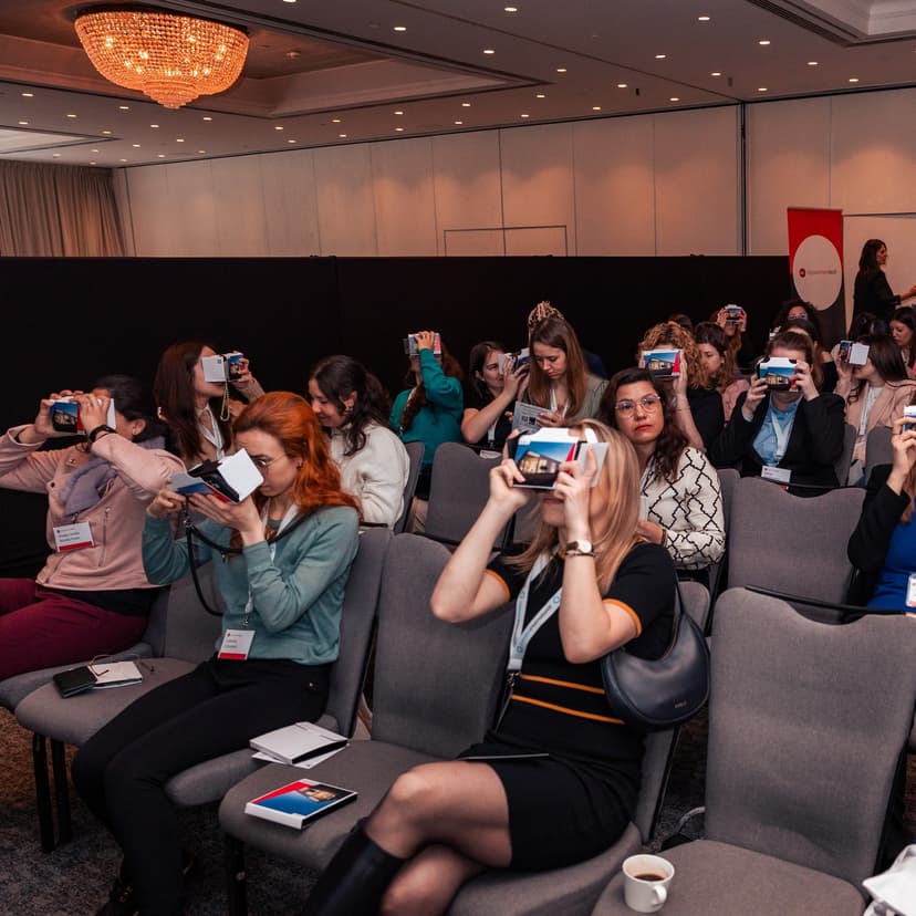 A group of women trying out VR headsets